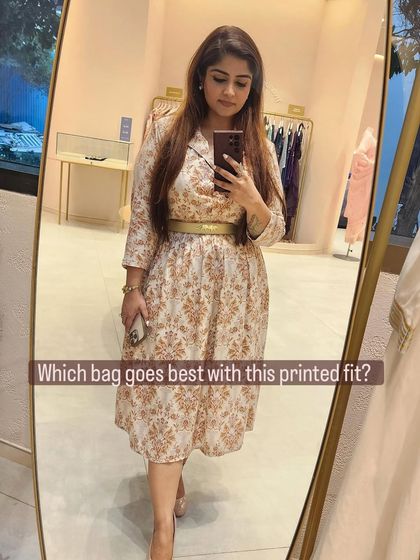 A poll-style image asking "Which bag goes best with this printed fit?" to engage the audience.