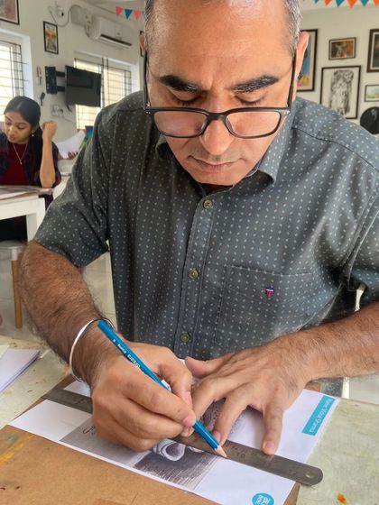 An adult student practices his sketching skills during a weekday batch. Our flexible timings for short term courses make it easy for working professionals to pursue their creative interests.
