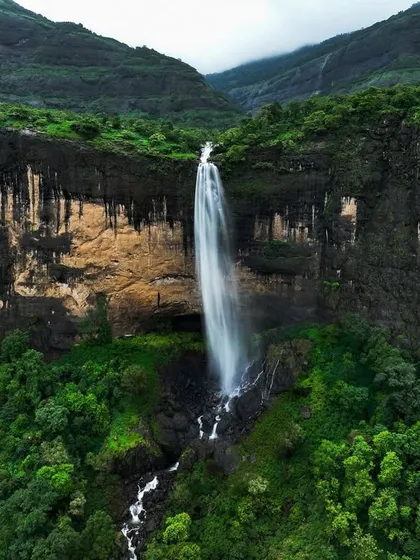 Another angle of Daityasur Waterfall, capturing the full drop from the cliff edge to the base. Each angle offers a new appreciation for its scale and beauty.
