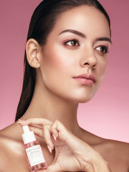 A close-up of the serum shot, showing the dewy, healthy skin. This is the result of great skin prep and subtle makeup, a key lesson in my classes.