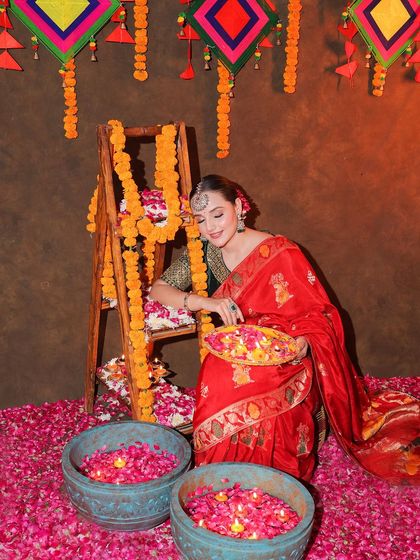 An entire Diwali-themed shoot featuring our red Banarasi saree. This series shows a complete concept, from decor to final look, providing rich inspiration for festive content.