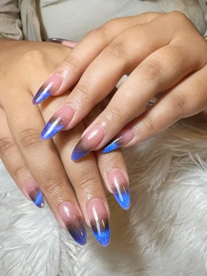 A close-up of the blue and black cat-eye ombre, highlighting the vibrant blue shimmer.