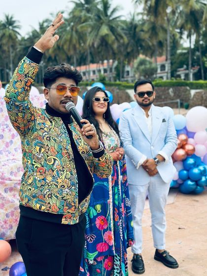 Addressing the couple at their pool party. Even in a casual setting, I ensure the couple remains the center of attention while everyone has fun around them.