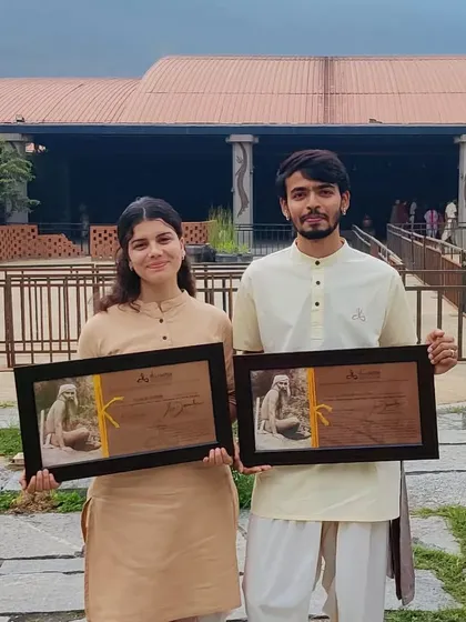 Holding my teaching certificate outside the Adiyogi Alayam at the Isha Yoga Center. This was the culmination of months of intense sadhana (spiritual practice) and the start of a new chapter.