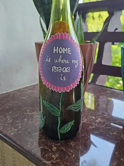 "Home is where my Amma is." A heartfelt message on a bottle painted during our workshop, a tribute to all mothers.