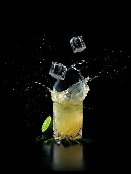 Lair’s Picante is a zesty eruption of flavours. This action shot captures ice and lime splashing into the glass, representing the thrilling journey your taste buds are about to take.