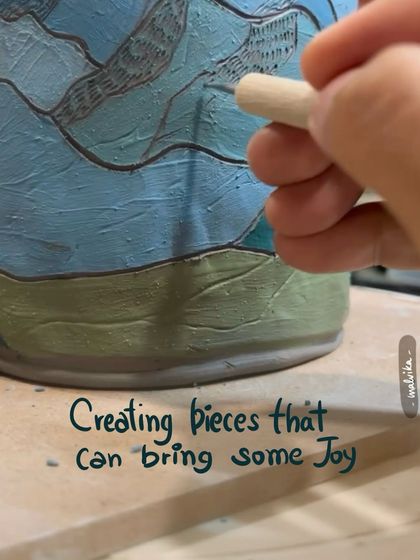 Carving a mountain landscape onto a large vase. This is how I transfer my love for the mountains onto my ceramic pieces, one line at a time.