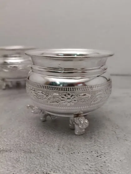 A German silver bowl with unique elephant-shaped legs, a design that is both auspicious and elegant.