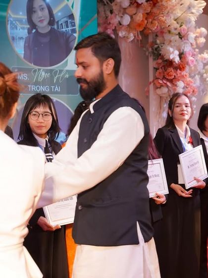 Honoring a student for her successful completion of the training. These events are a celebration of our shared commitment to personal growth and the global yoga movement.