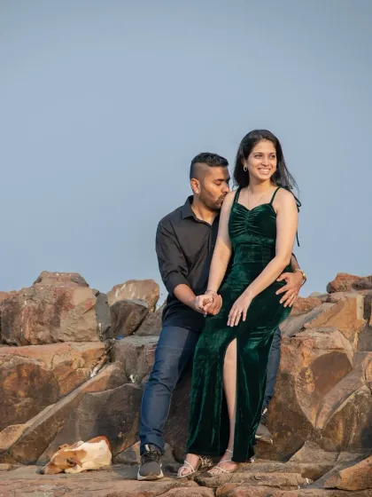A sweet and tender moment during a pre-wedding shoot by the sea. The natural interaction between the couple makes for the most authentic and heartfelt photos.