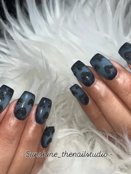 A moody and modern design. This set features a black and grey ombre with hand-painted, textured black glitter hearts.
