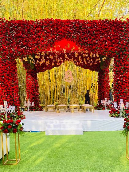 A duplicate of the magnificent red rose mandap, showcasing its grandeur from a straight-on perspective.