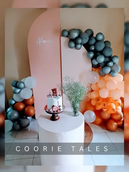 Minimalistic, aesthetic, and chic. This simple yet beautiful setup uses two arched backdrops in contrasting colors and a carefully placed balloon arrangement to create a modern and stylish focal point for any party.