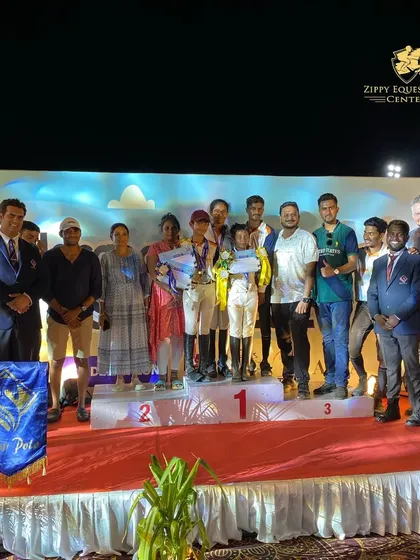The entire team celebrating a successful weekend at the NASR Polo Summer Equestrian Championship, with multiple podium finishes across different categories.