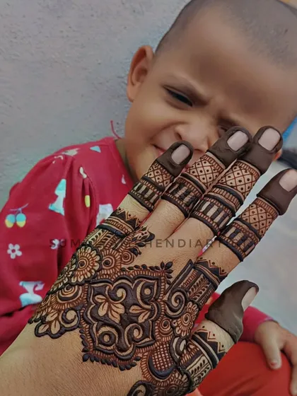 My kind of therapy. Applying henna for myself after a long time, with my little one looking on.