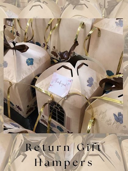 Elegant house-shaped boxes make for unique return gift hampers. These are perfect for housewarming parties or any event where you want to give guests a memorable token of thanks.