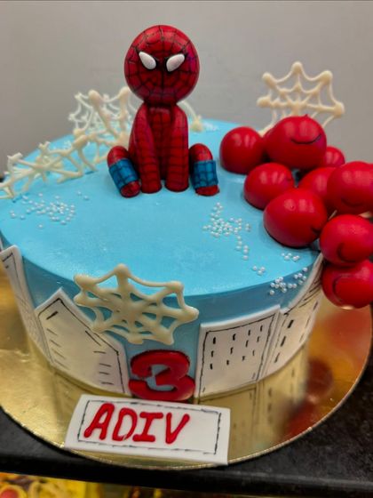 A more detailed Spiderman cake, this one includes a 3D fondant Spiderman figure and city building details along the side. It's a great example of how I can add dimension and storytelling to a character cake.