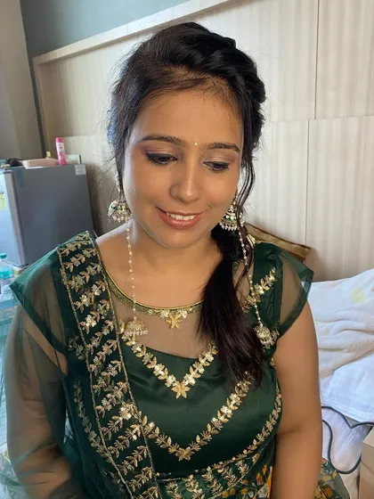 Another shot of this subtle Mehendi look. The makeup is minimal, ensuring the focus remains on the bride and the intricate henna designs.