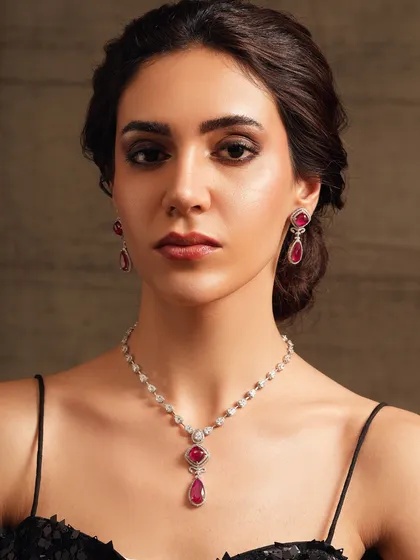 A delicate yet dazzling diamond and ruby necklace, perfect for adding a touch of color and sparkle to your evening gown.