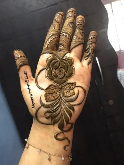 The finished rose design, with detailed fingers. A classic and romantic look.