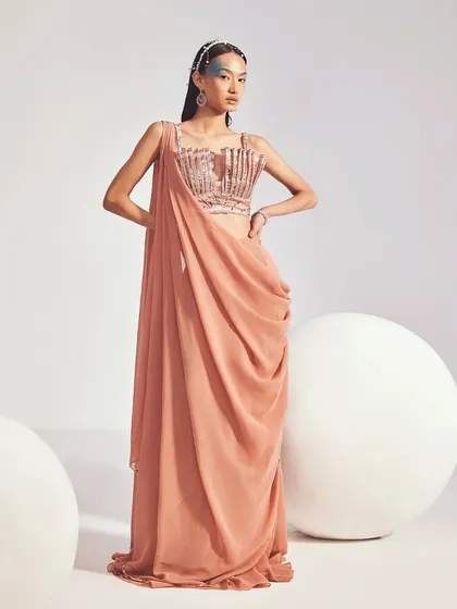 The Mira Saree Set, a love letter to modern silhouettes. This full-length view shows the effortless wear and dreamy pastel palette of the draped saree.