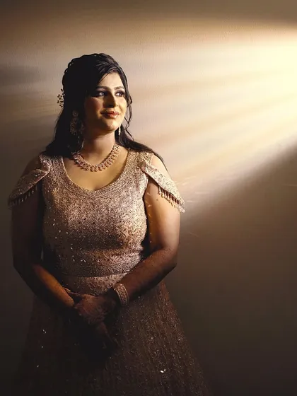 An artistic portrait using a beam of light to create a dramatic and ethereal effect. This makes for a unique and memorable photo.