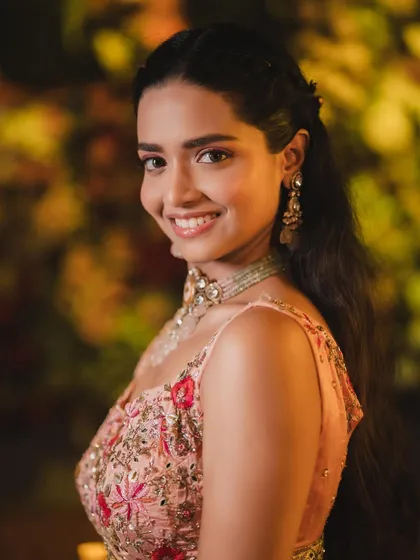 A radiant Haldi look. I used a subtle skin-finish, a pop of colorful eyeliner, and glossy lips for a look that is fresh and modern.