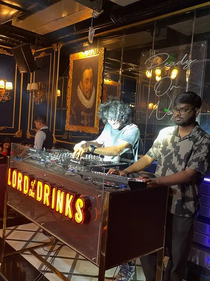 A shot from a lit Saturday night at Lord of the Drinks, working the console and setting the vibe.
