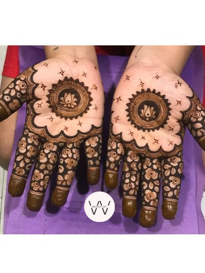 A top-down view of the Vat Purnima lotus mandala design.