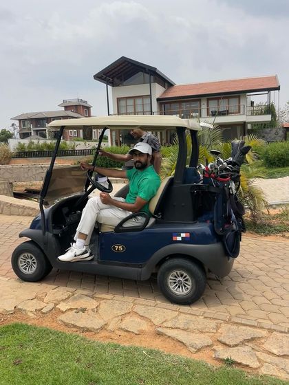Navigating the course in a golf cart between holes. This is all part of the complete golf experience, offering moments to reset and discuss the game.