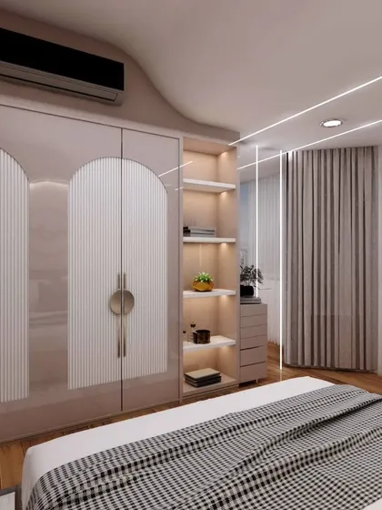 A look at the wardrobe and storage in the daughter's room, featuring arched doors with fluted details. The design is both stylish and practical, with open shelving for display.