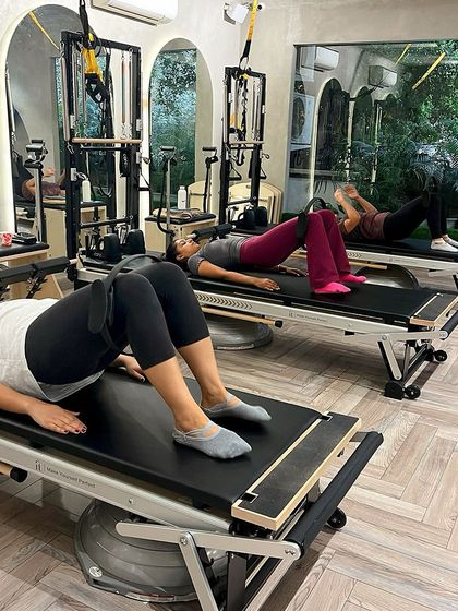 A moment of rest and reset on the Reformer. Even the transitions between exercises are mindful, focusing on breath and control.