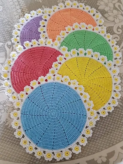 Just look at this rainbow of daisy doilies. This shows how you can customize the colors of my designs to perfectly match your home decor, whether you want something bright and funky or soft and subtle.