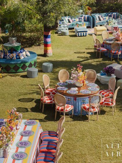 An aerial view of the seating arrangements at 'The Roots' Mehendi. The mix of bold patterns, colors, and sculptural furniture created a visually stunning and cohesive design.