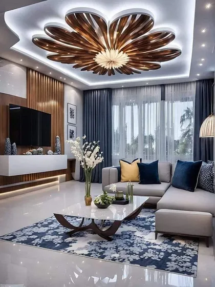 Your living room should be a centerpiece. Here, I've used a stunning flower-petal ceiling light fixture and a cohesive color palette to create a modern, luxurious space that feels both grand and inviting.