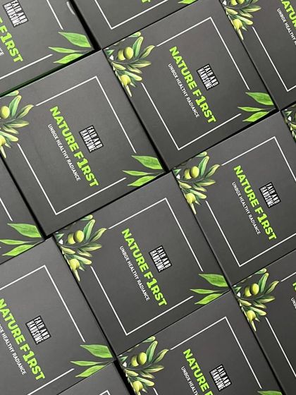 Another shot of the sleek, custom-made boxes for the male grooming hampers, showing off the clean design and branding.