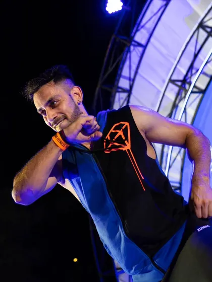 Mistakes are proof that you are trying. A candid shot of me in the middle of a move on stage at the Active Noida event. It's all about learning, growing, and evolving together without fear of judgment.