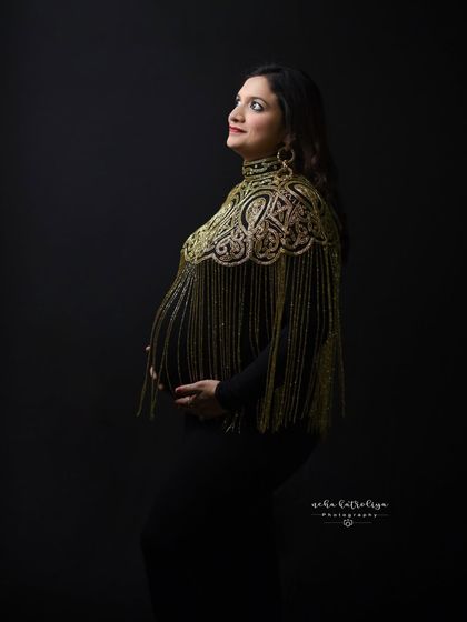 A profile shot that captures the intricate detail and movement of the golden fringe.