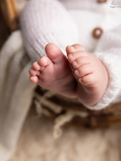 A close-up of perfect little baby toes. These are the details that change so quickly, and I love preserving them for you.