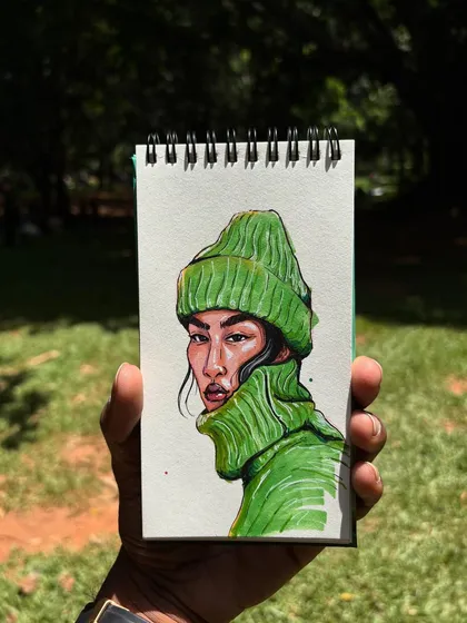 This piece, drawn in my sketchbook, shows the vibrant results I get with alcohol markers. I love how the bright green pops, creating a custom portrait that’s full of life and personality.