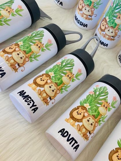 These personalised sipper bottles with a jungle theme are a huge hit for kids' birthday party return gifts. They are practical, cute, and can be customised for each child.