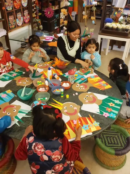 My toddler art sessions are all about joyful, hands-on exploration. I guide our youngest creators through fun craft projects that help develop their fine motor skills and ignite their imagination in a playful setting.
