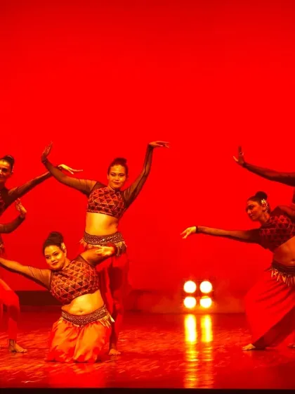 A powerful moment from our iconic "Satori" performance. Our professional troupe is captured on stage, showcasing the harmony and precision that we bring to every event.