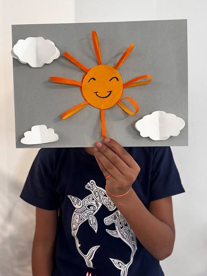This student's sun craft is neat and cheerful, a perfect piece of art to brighten any day.
