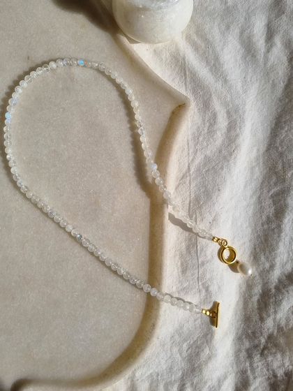 The 'vitika' Rainbow Moonstone ball toggle necklace, a piece I designed to bring inner confidence and creative energy.