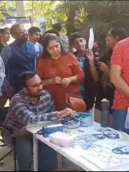 Here I am at my table, surrounded by curious festival-goers. These events are always a great experience.