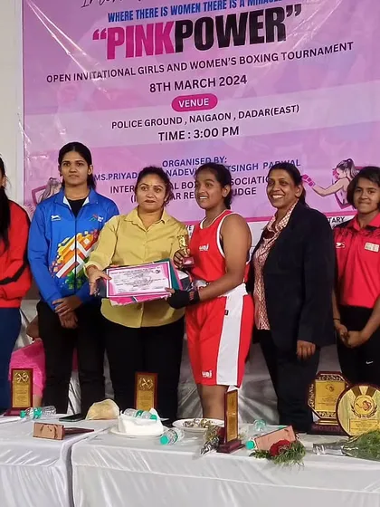 Another one of our junior girls celebrating her victory at the women's tournament. The future of women's boxing is strong here.