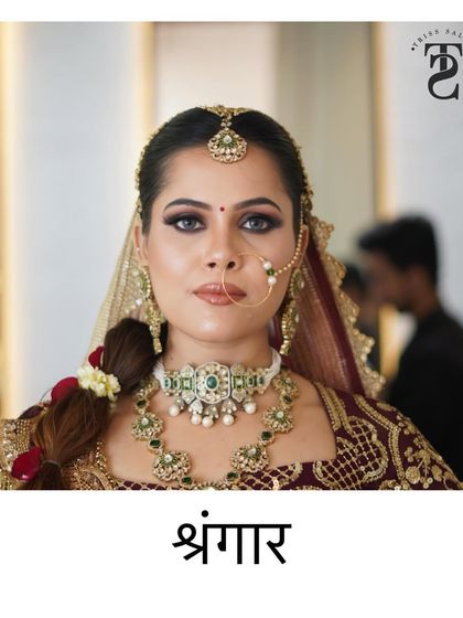 A powerful portrait of the bride. The makeup is bold yet elegant, designed to make a statement while honoring traditional aesthetics.