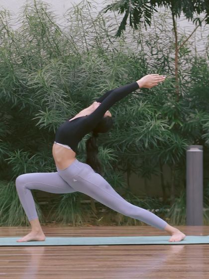 A variation of Veerabhadrasana I (Warrior Pose I) with a backbend. This pose builds strength in the legs while simultaneously opening the chest and shoulders for a powerful stretch.