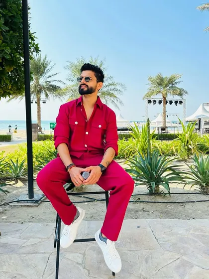 Another shot in the red co-ord set, capturing the bright, sunny vibe of the location.